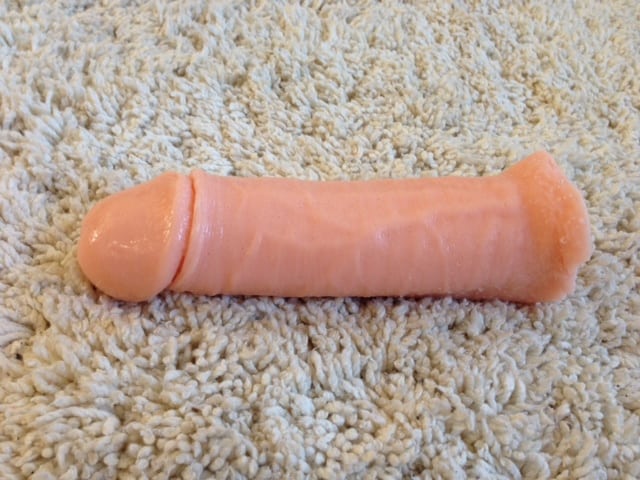 The side view of the finished light skin-toned Clone-A-Willy DIY dildo.
