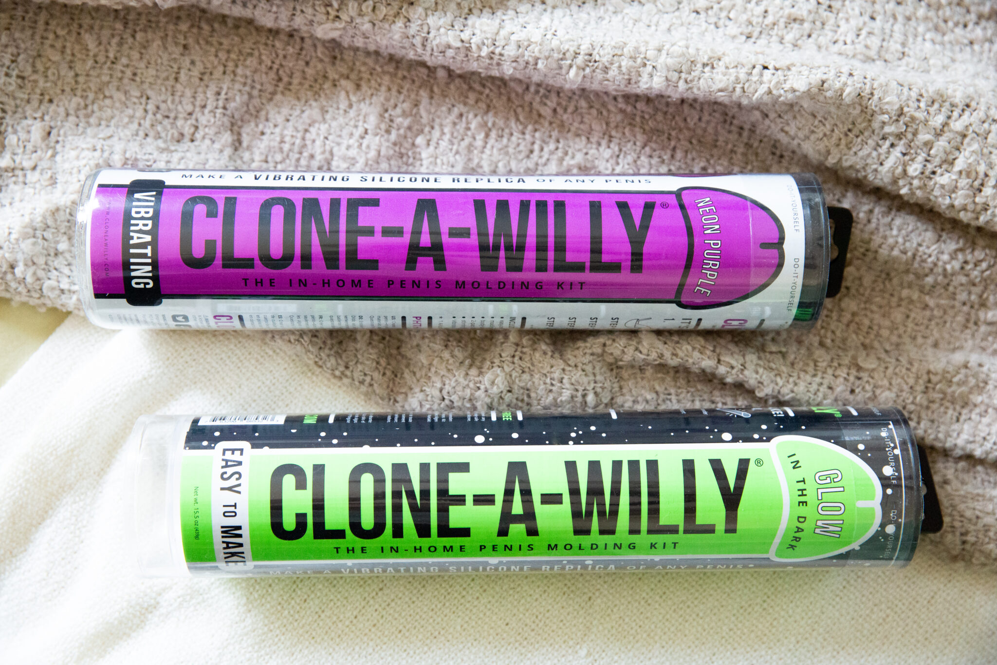 The Clone-A-Willy kits in neon green and purple.